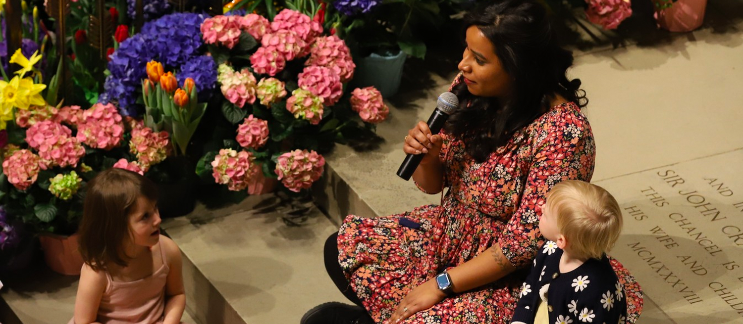 Nupur sharing the Children's moment with 2 kids on Easter at the chancel steps 